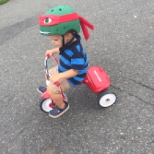 And then our second one came along. Here he is at age 2 learning to peddle a trike!