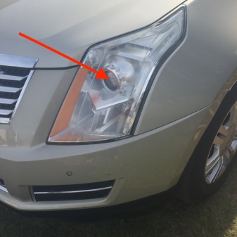 Photos shows headlight "kit" while arrow points to the "projector"